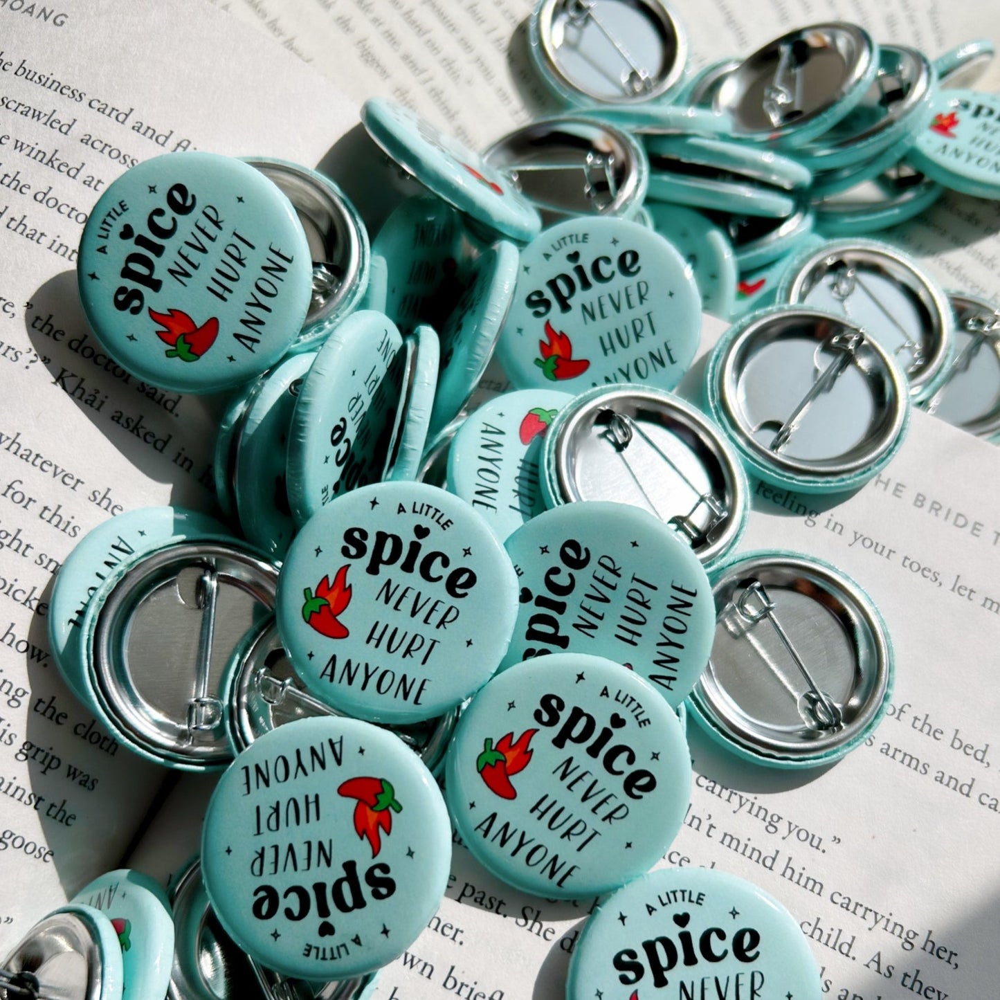 Aqua A Little Spice Button