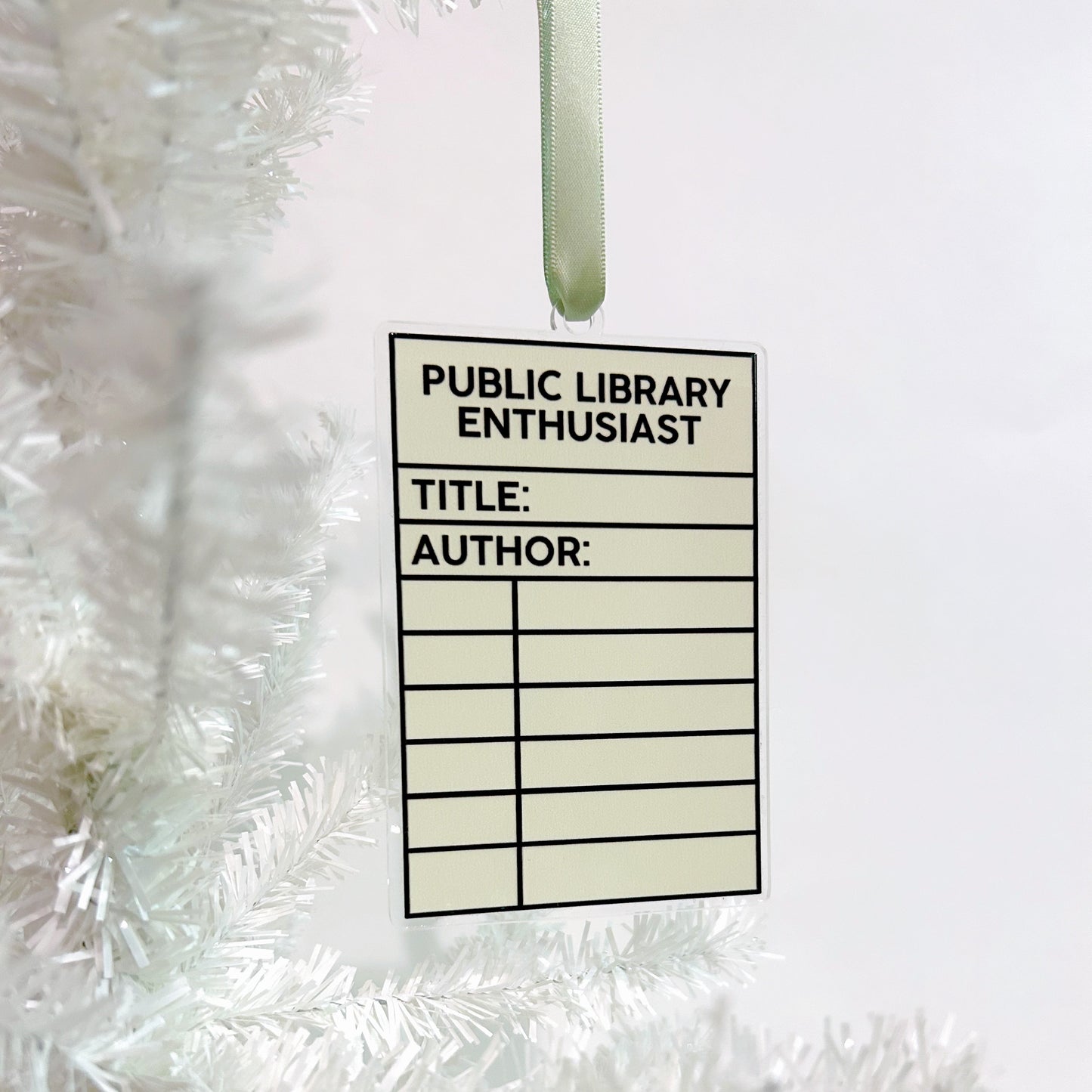 ornament labeled 'Public Library Enthusiast' on a white textured background