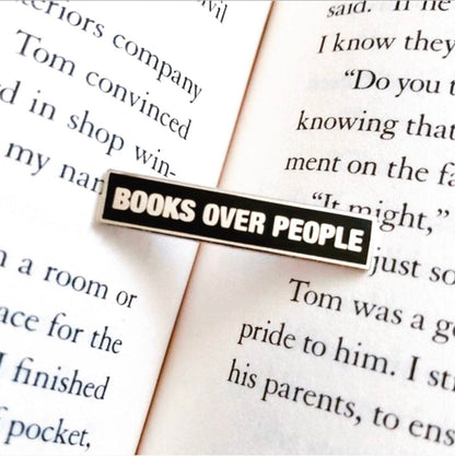 Mini Books Over People Enamel Pin